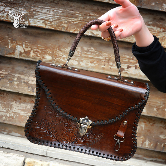 Brown womens bag with decorated leather and laced stiching
