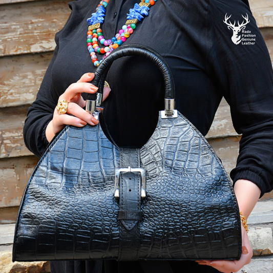 Black womens bag with snakeskin pattern