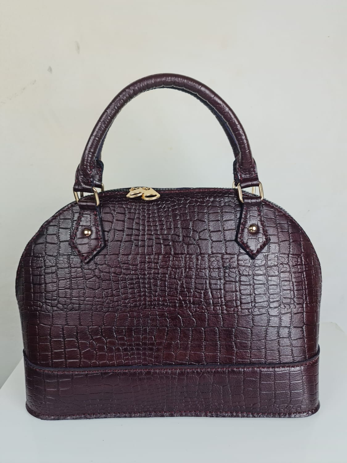Burgundy genuine leather with snakeskin pattern