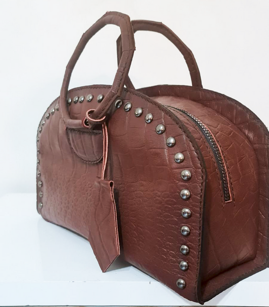 Elegant leather bag with padded circle handles