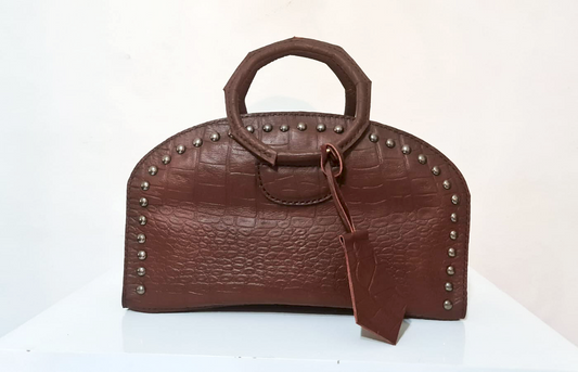 Elegant leather bag with padded circle handles
